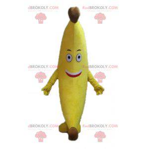 Gigantische gele banaan mascotte. Exotisch fruit mascotte -